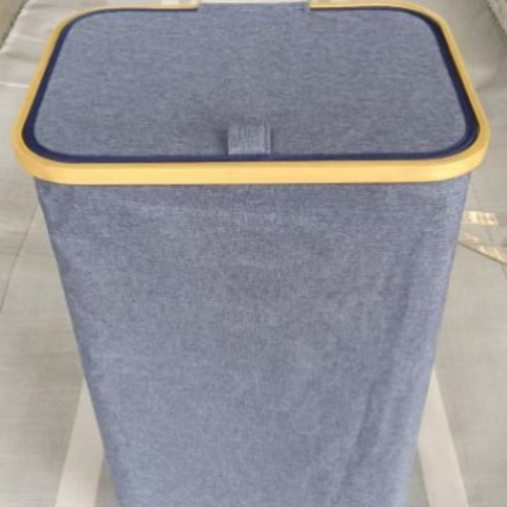 Stylish laundry basket with wooden lid Kalsten
