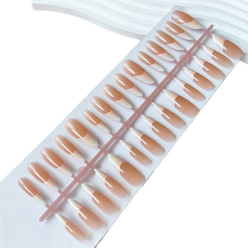 Artificial nails in the elegant French tip design Kalsten