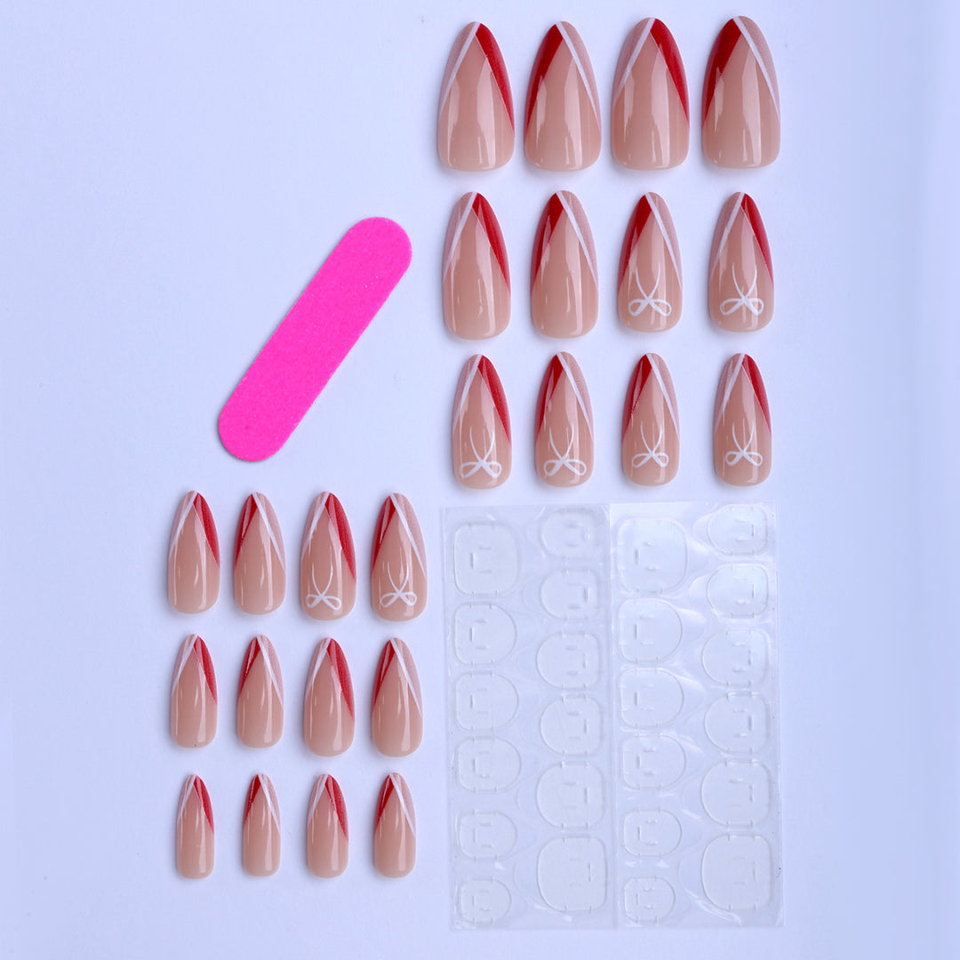Artificial nails in elegant stiletto design with bow accents Kalsten