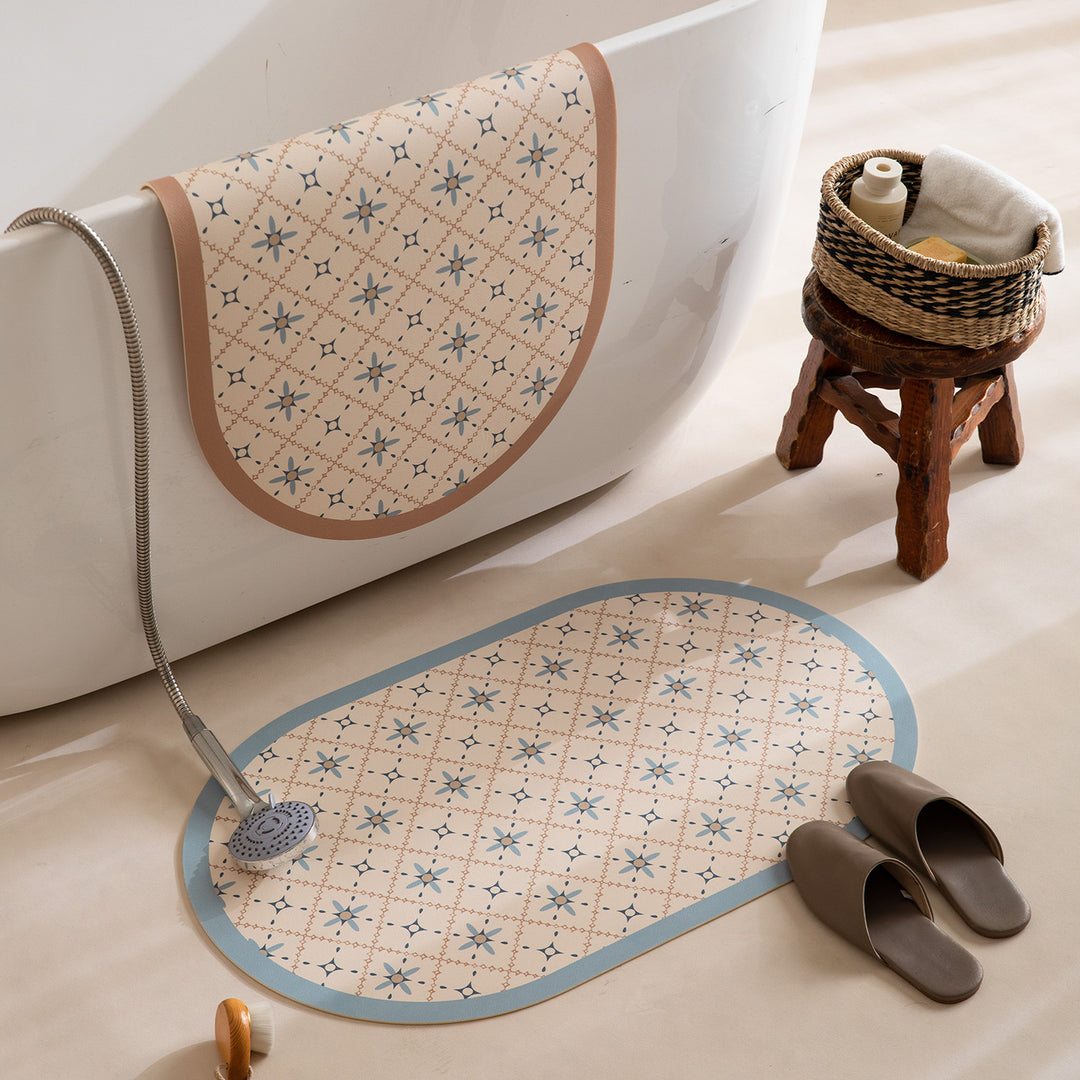 Oval wipeable placemat with embossed tulip pattern and non-slip underside Kalsten