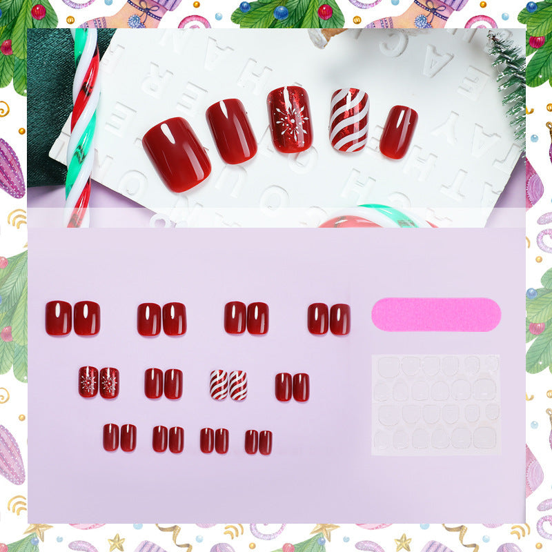 Artificial nail set with festive designs and glitter accents Kalsten