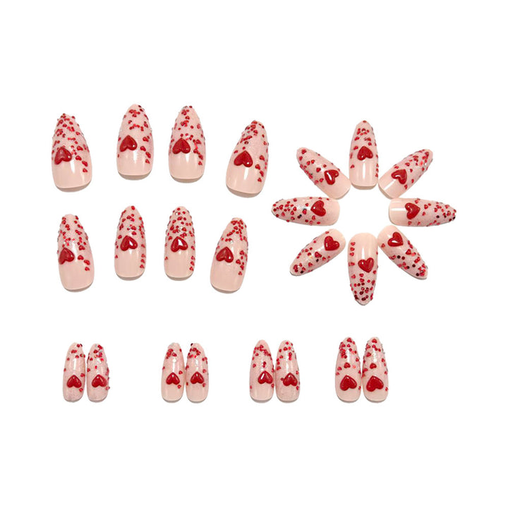 Glamorous artificial nails with heart design and glitter Kalsten