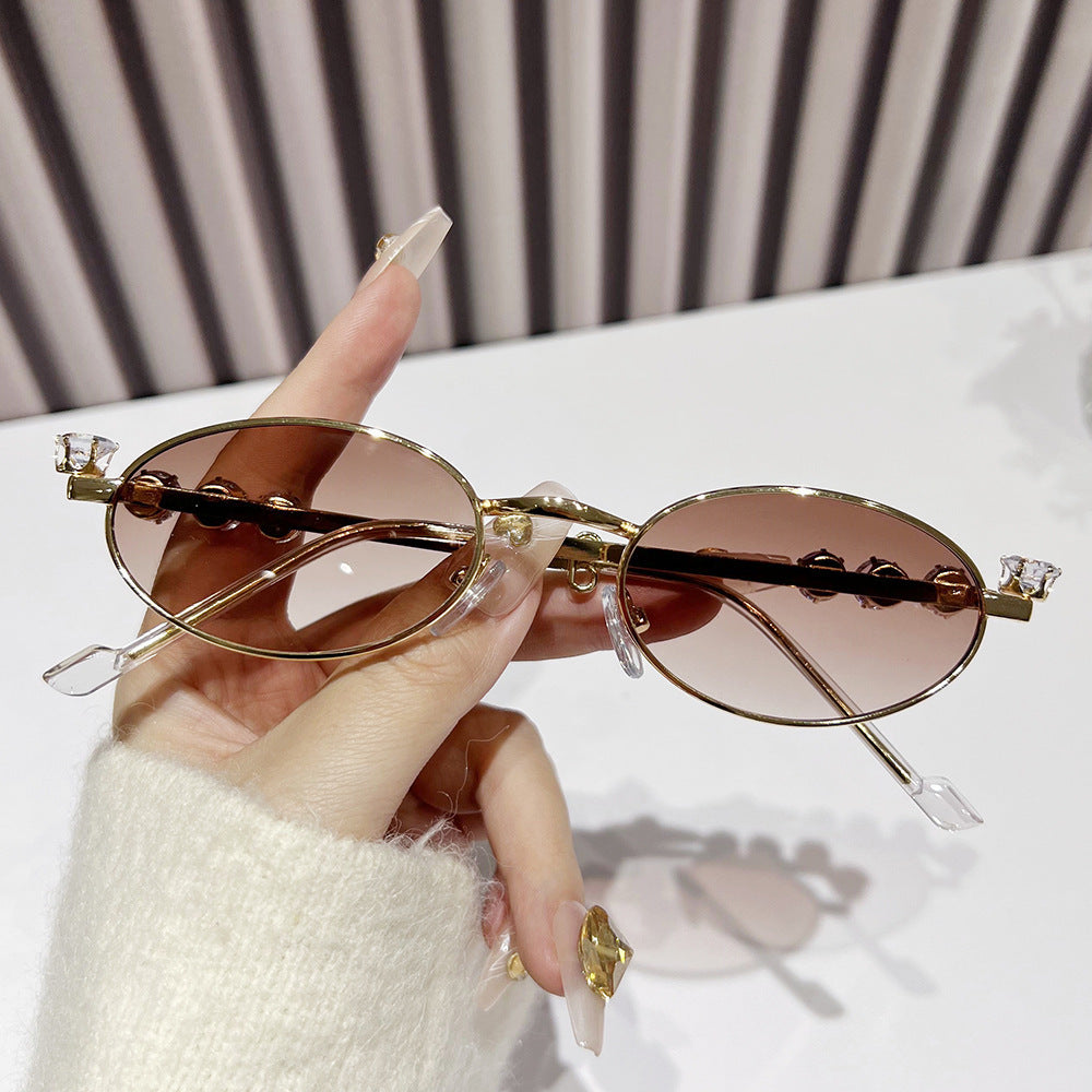Fashion-Forward Oval Sunglasses with Crystal Accents Kalsten