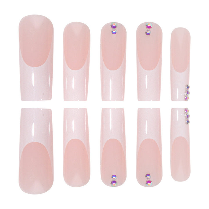 Nail set with elegant French tips and sparkling rhinestone embellishments Kalsten