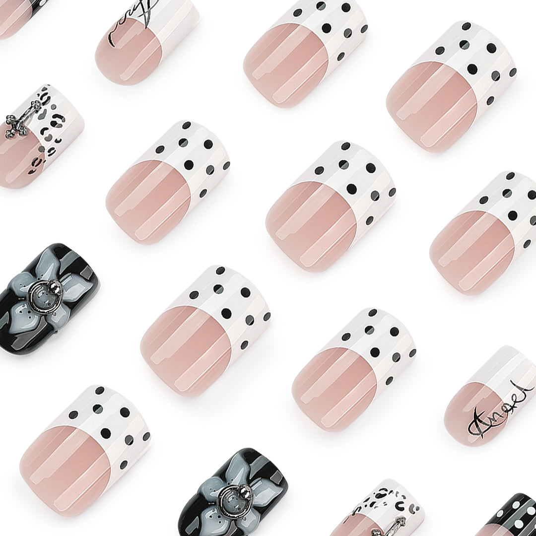 Artful nail extensions with elegant black-and-white design Kalsten