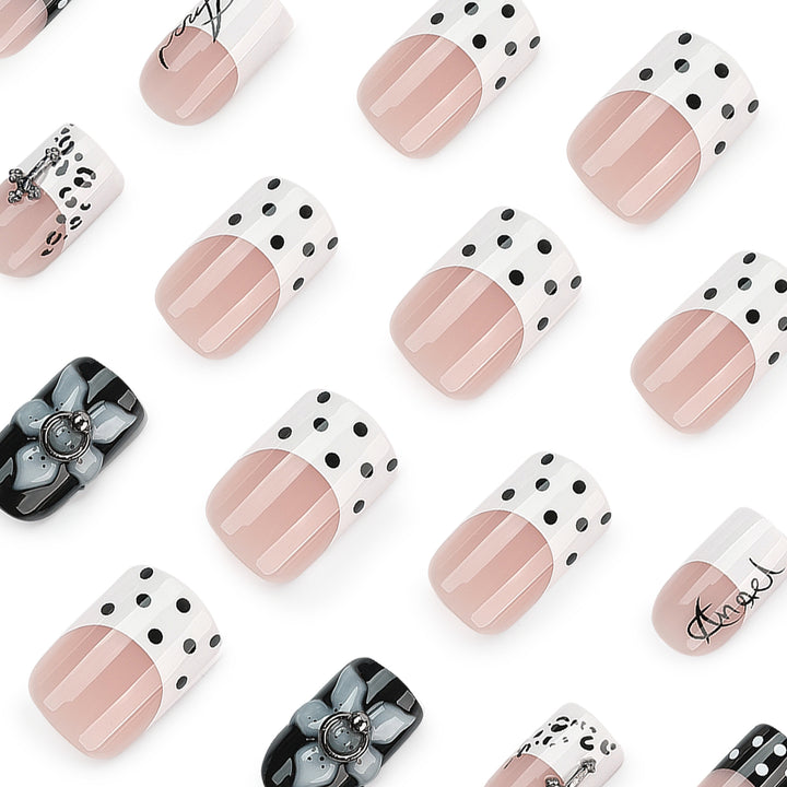 Artful nail extensions with elegant black-and-white design Kalsten