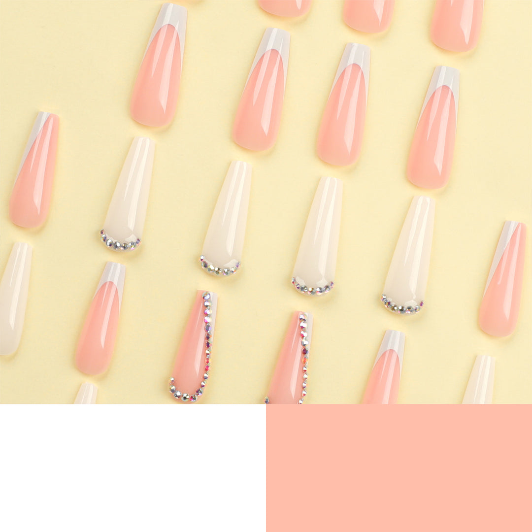 Artful nail extensions with rhinestone embellished accents Kalsten