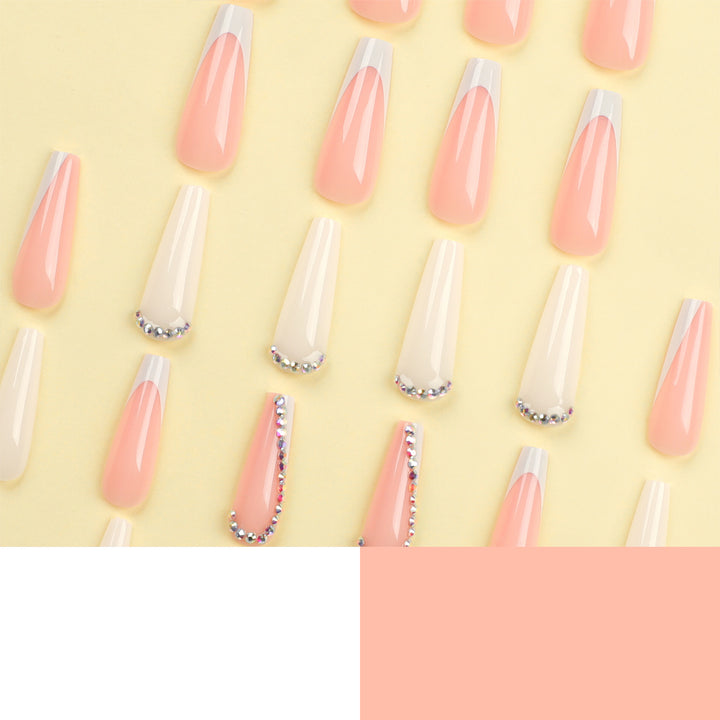 Artful nail extensions with rhinestone embellished accents Kalsten