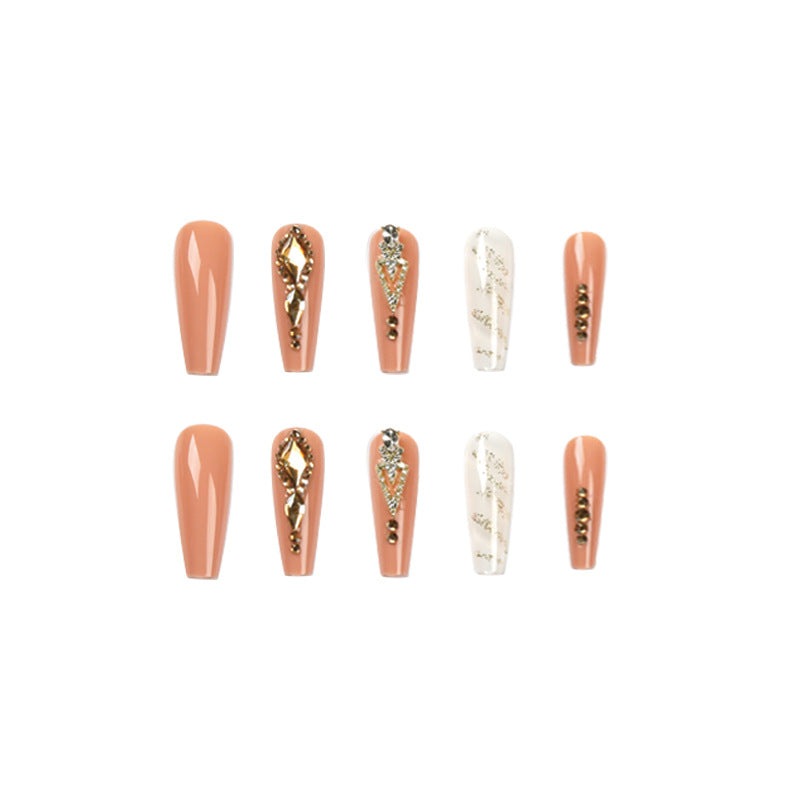 Artful nail extensions with glitter embellishments and delicate accents Kalsten