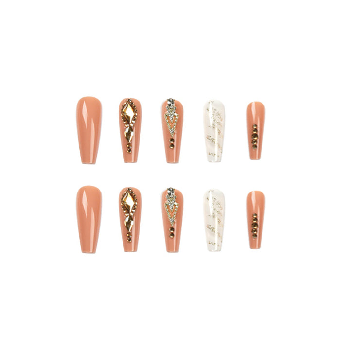 Artful nail extensions with glitter embellishments and delicate accents Kalsten
