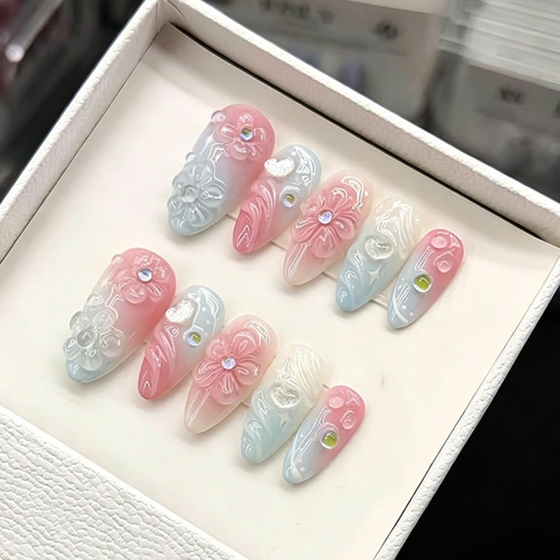 Acrylic nail set with elegant ombre design and floral decorations Kalsten