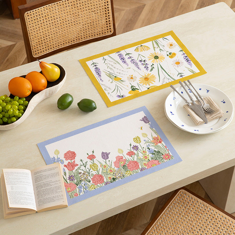Printed rectangular placemat made of cotton blend with floral illustration print and contrast border Kalsten