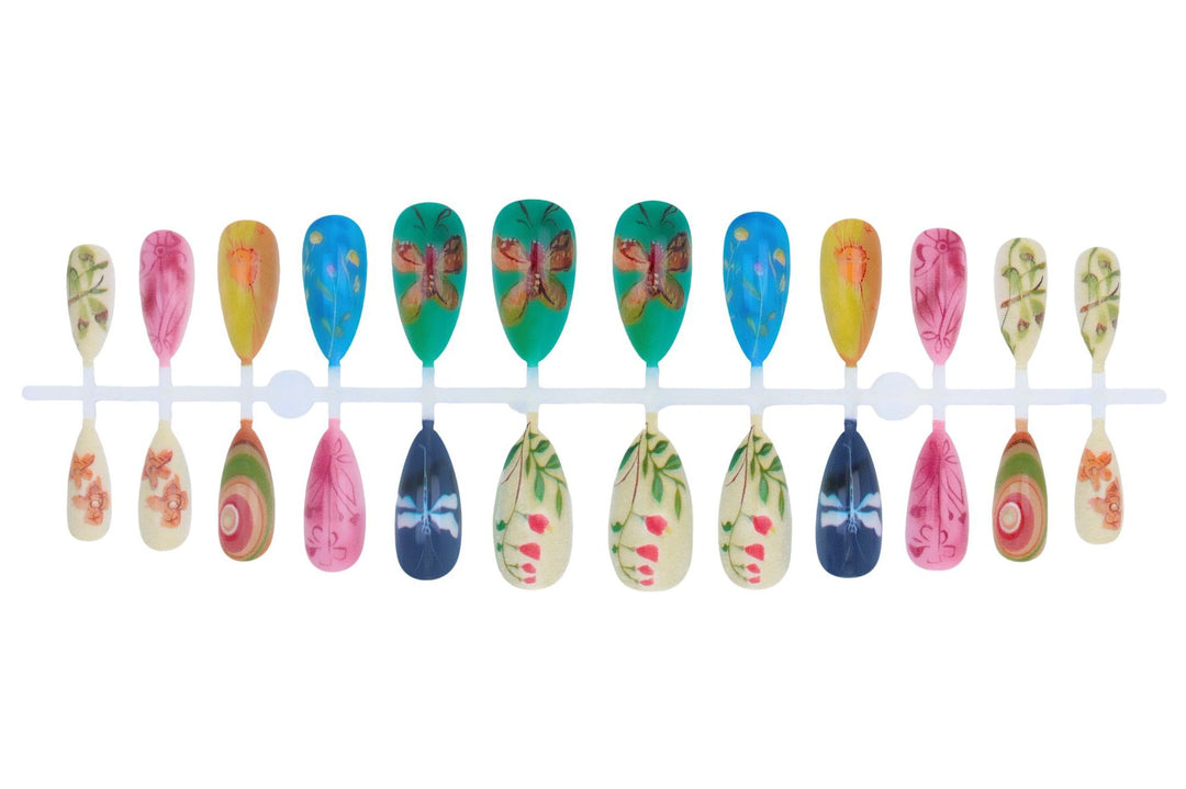Nail art set with creative hand-painted designs and elegant details Kalsten