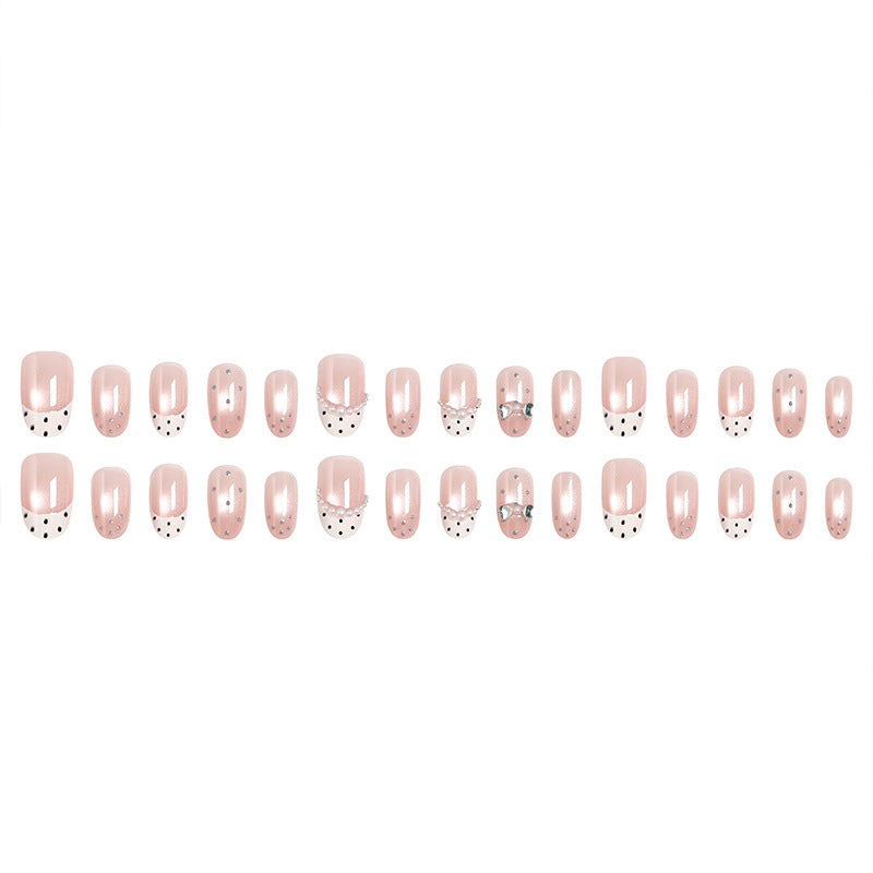 Artificial nail set with elegant French design and delicate pearl embellishments Kalsten