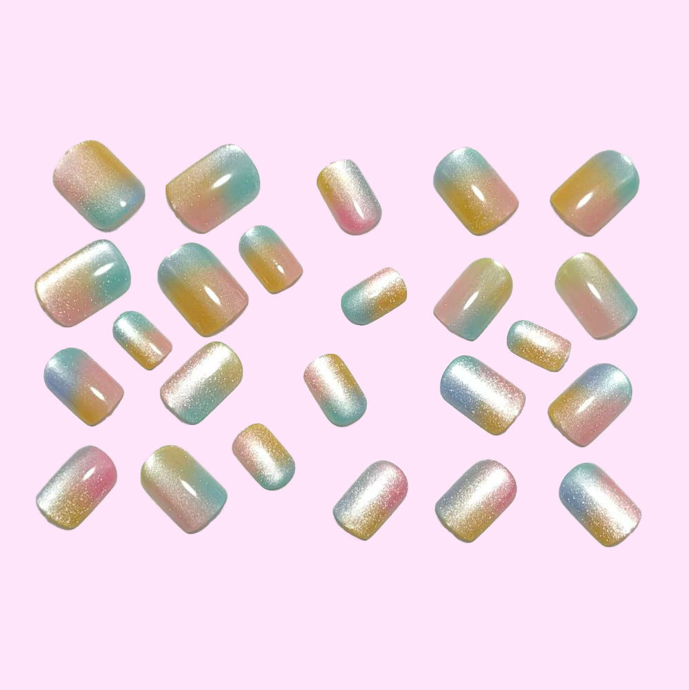 Artificial nails in delicate ombre design with glitter effects Kalsten