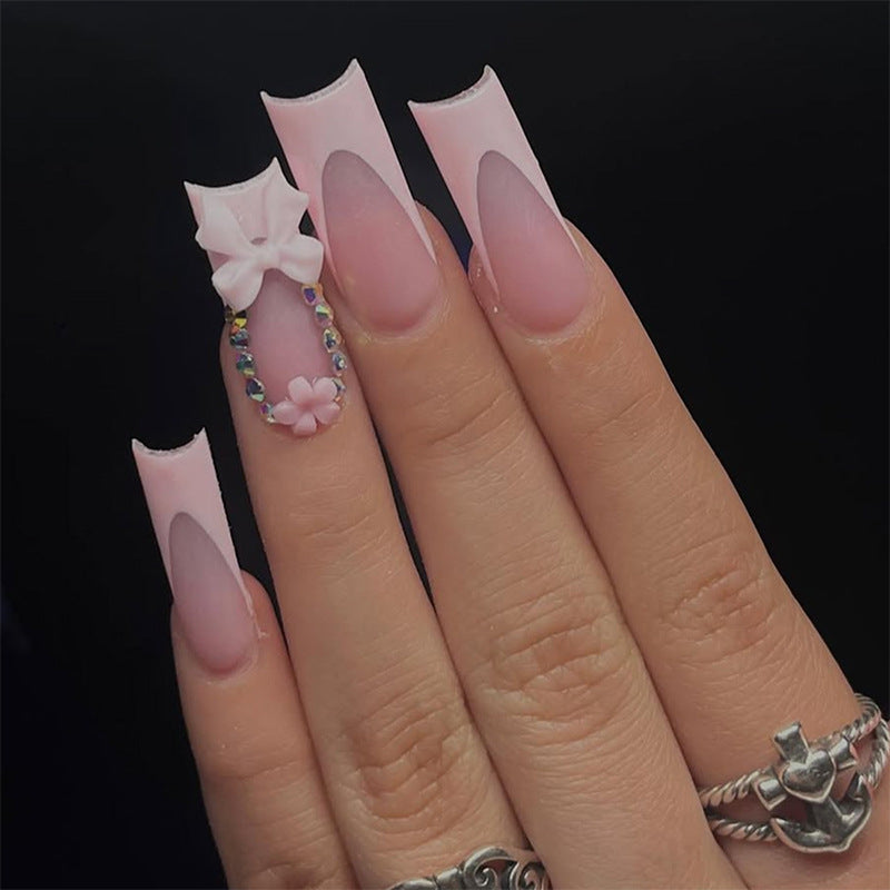 Decorative Press-On Nail Art with Floral and Bow Accents kalsten