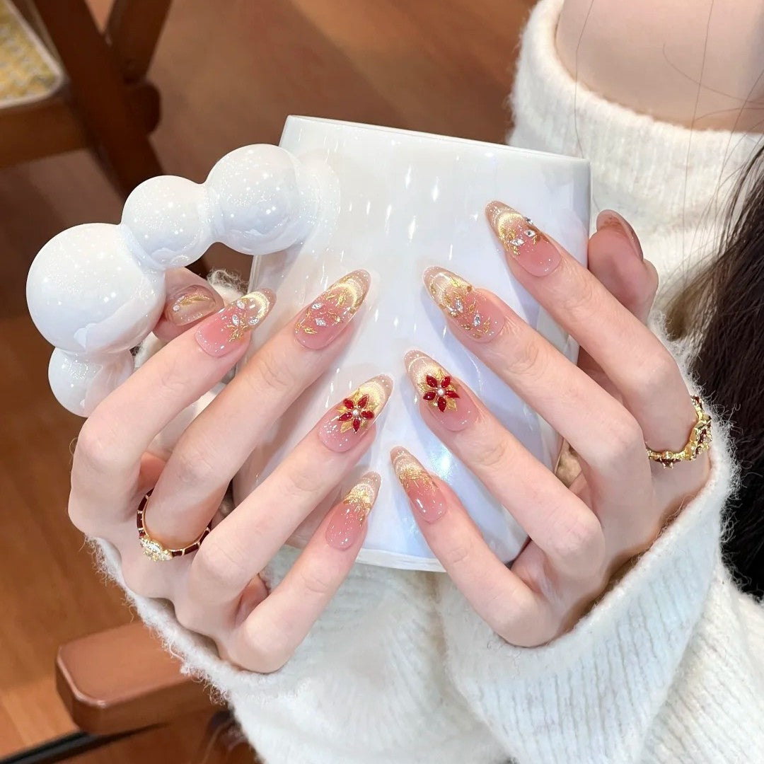 Artificial nails with elegant flower design and glitter accents Kalsten