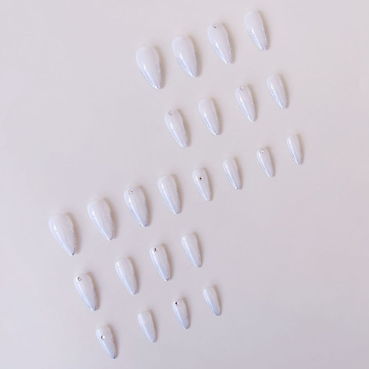 Acrylic nail set with elegant tips and sparkling accents Kalsten