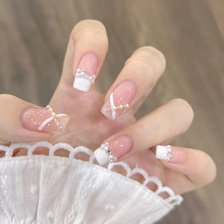 Artificial nails with heart design and glamorous accents Kalsten
