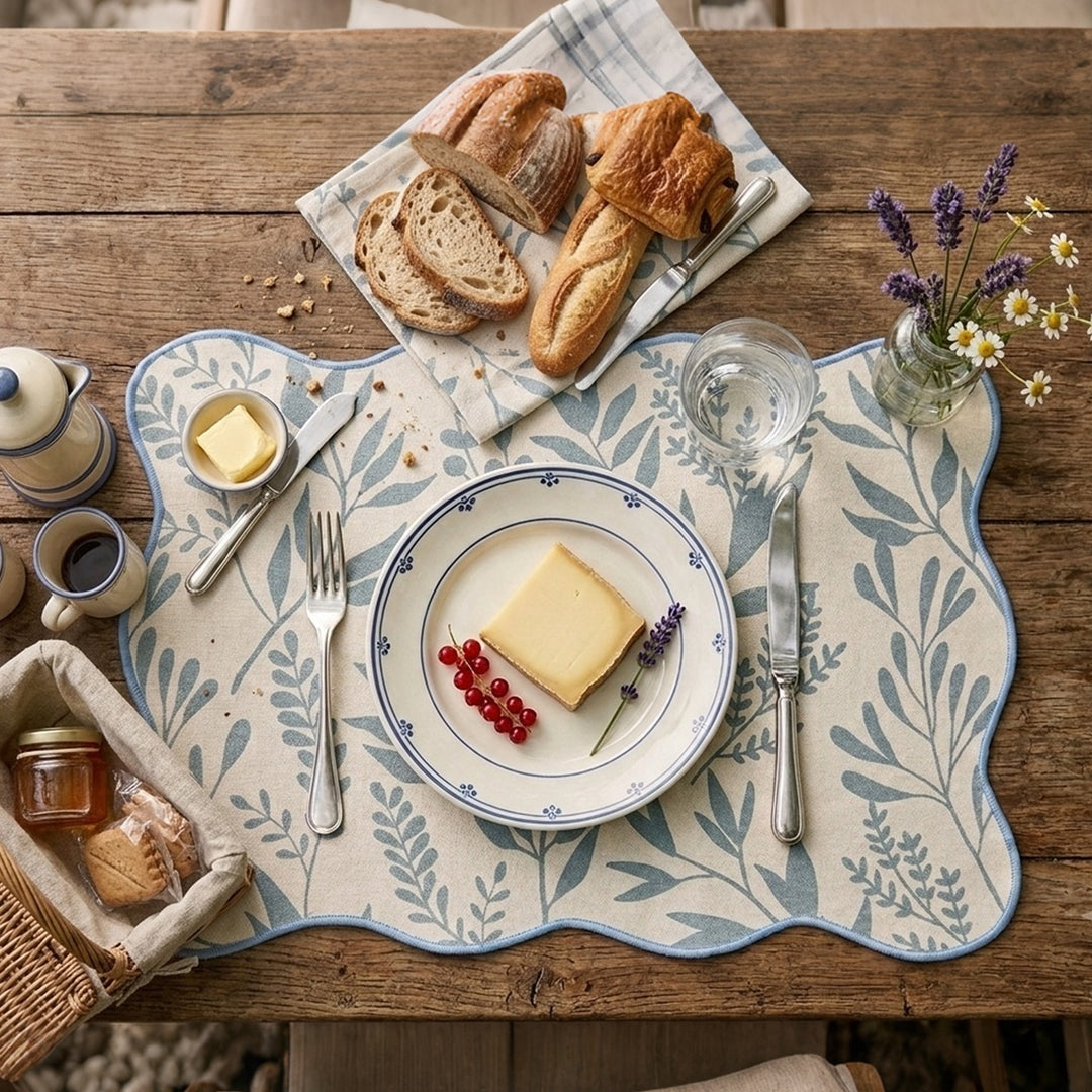 Shaped table set with curved contour and botanical leaf pattern Kalsten