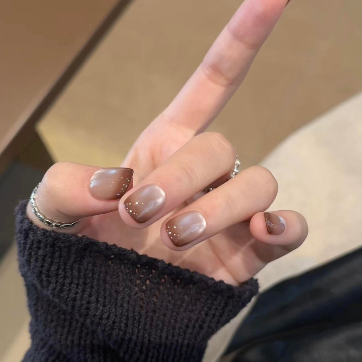 Artificial nails with elegant gradient color and glitter elements Kalsten