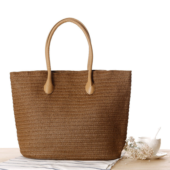 Spacious straw shopper with leather carrying handles Kalsten