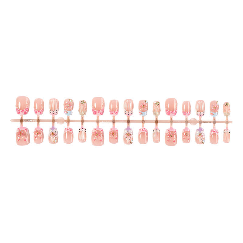 Artificial nail set with floral accents and glamorous decorations Kalsten