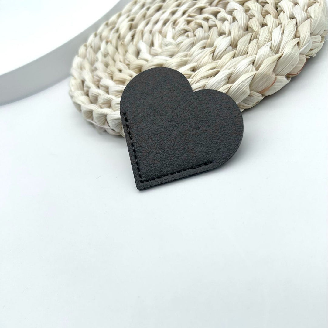 Heart-Shaped Leather Accessory Kalsten