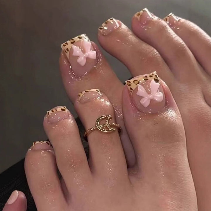 Nail art set with vibrant bow design and trendy leopard pattern Kalsten