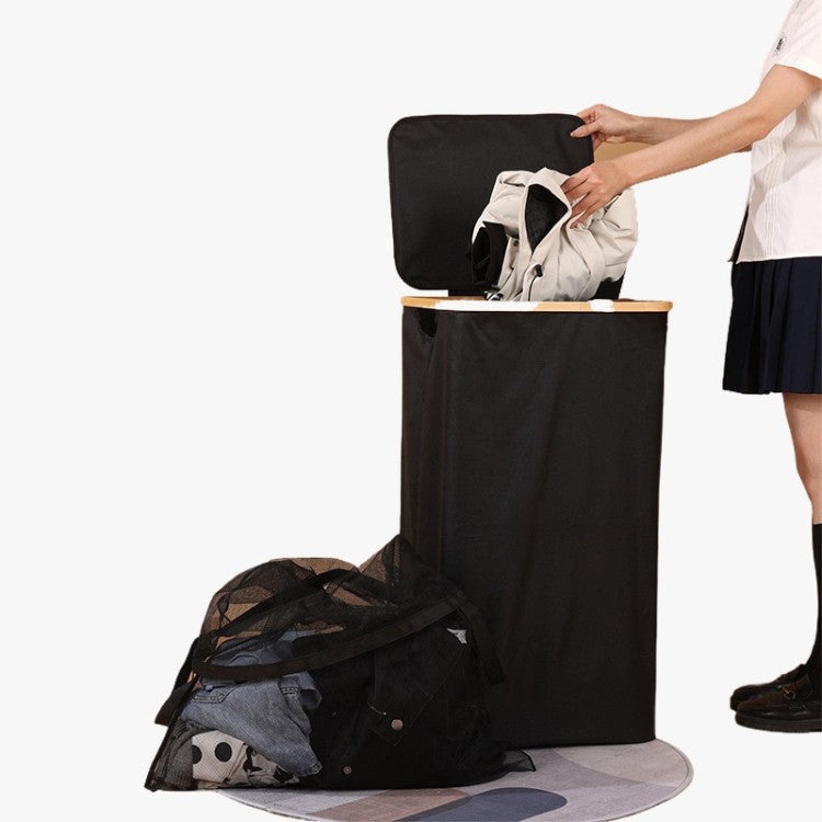 Elegant laundry container with practical lid and carrying system Kalsten