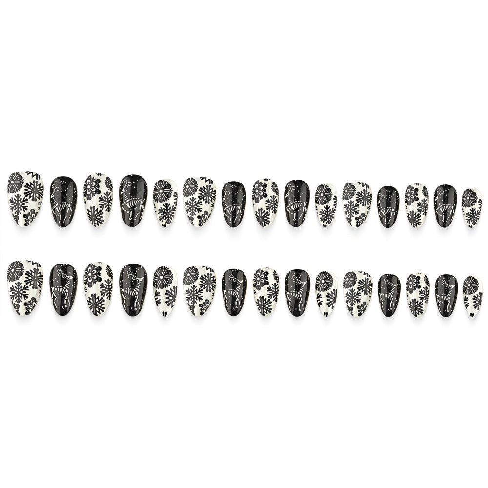 Artificial nails in a unique winter design with snow and reindeer motifs Kalsten