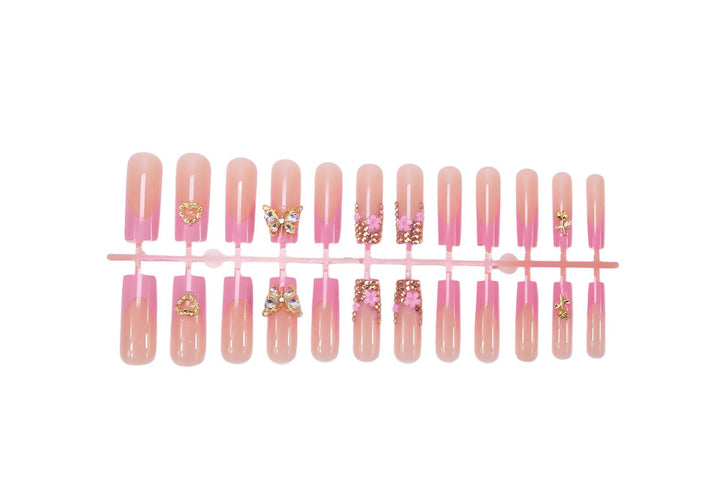 Artificial nail extension with glamorous embellishments Kalsten