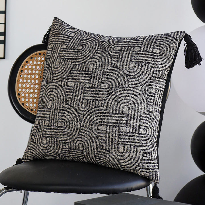 Square cushion cover made of textured bouclé weaving with geometric relief and corner tassels Kalsten