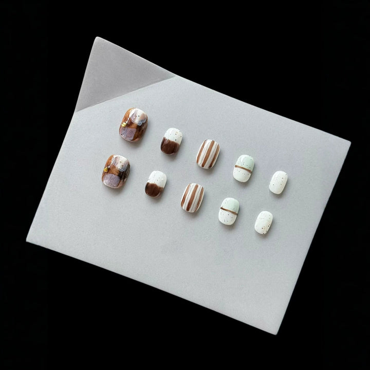 Artistic Press-On Nail Set with Geometric Patterns and Glossy Finish