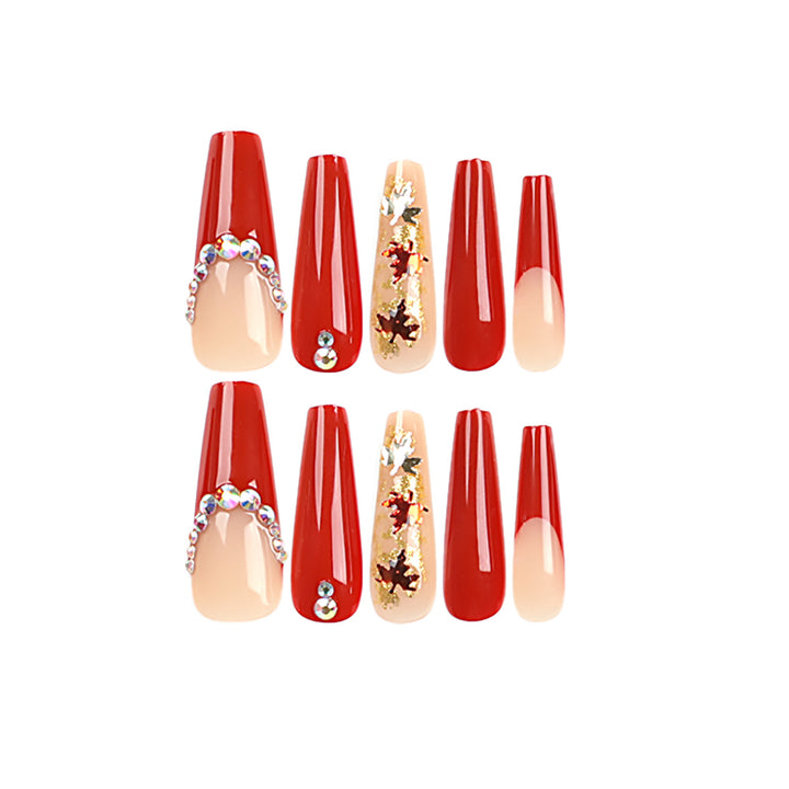 Glamorous acrylic nails with leaf design and glitter accents Kalsten