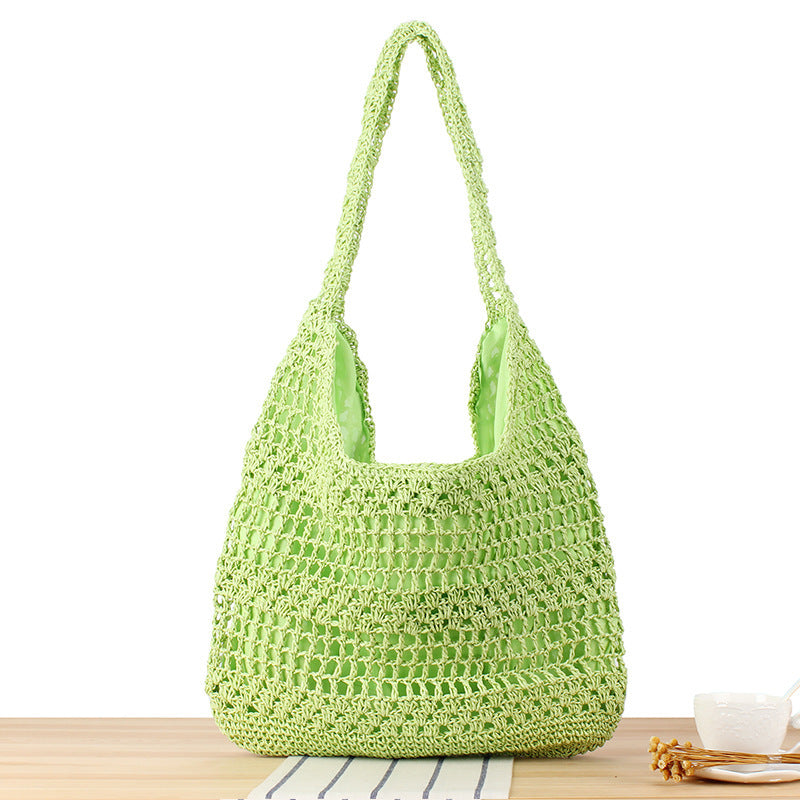 Handbag with floral appliqué Made of natural material Kalsten