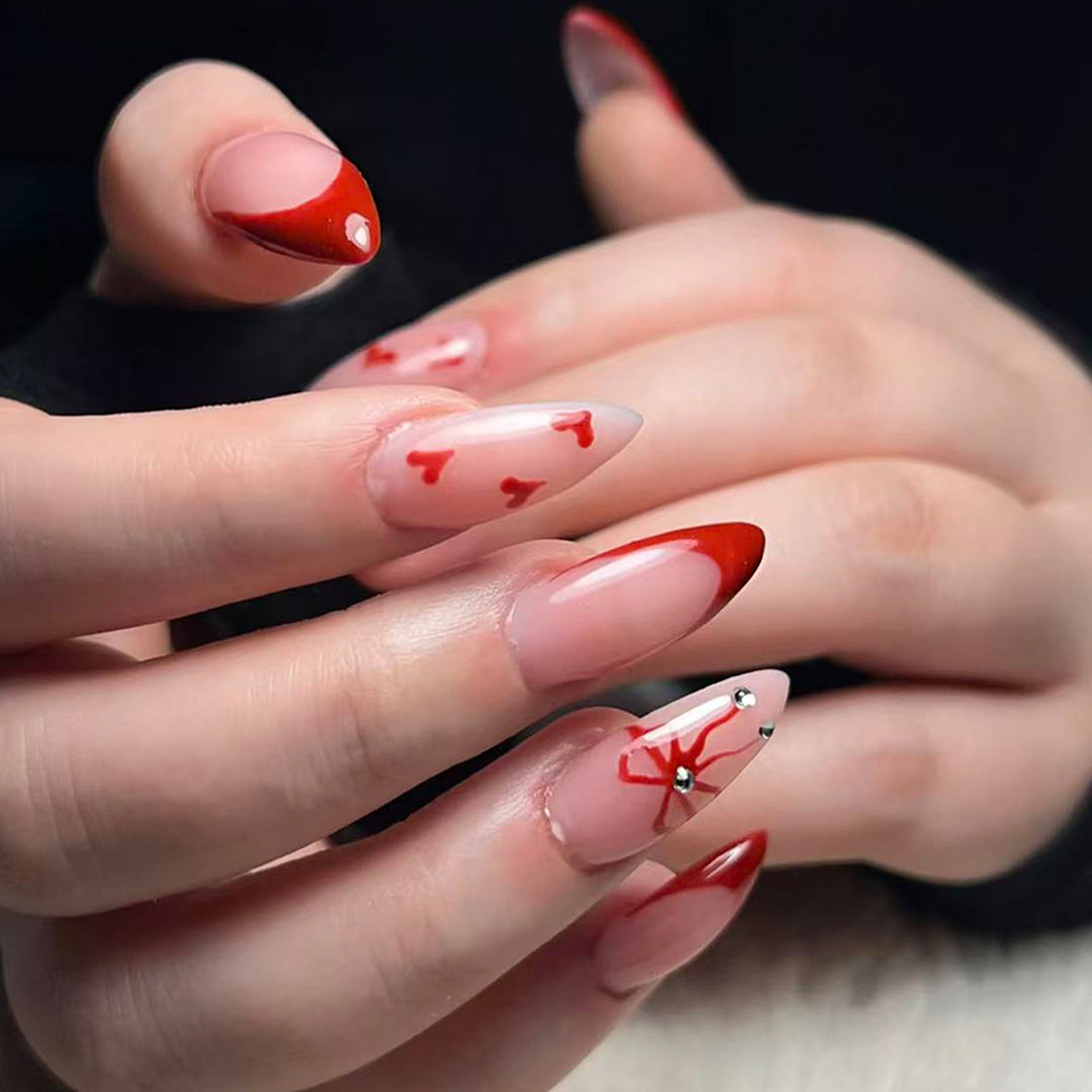 Artificial nails with elegant heart designs and glamorous accents Kalsten