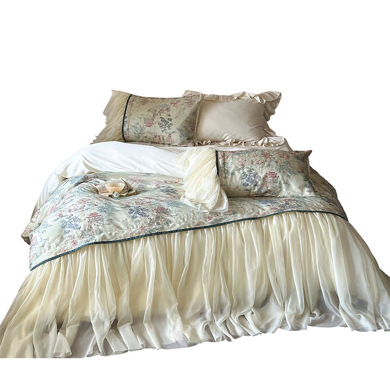 Satin bedding set with ruffled bed skirt and vintage toile print