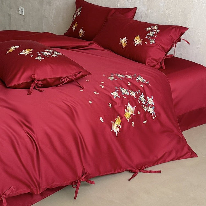 Luxurious satin bedding set with intricate floral-fish embroidery