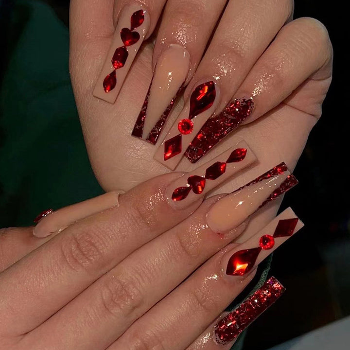 Artfully designed nail extensions with sparkling accents Kalsten