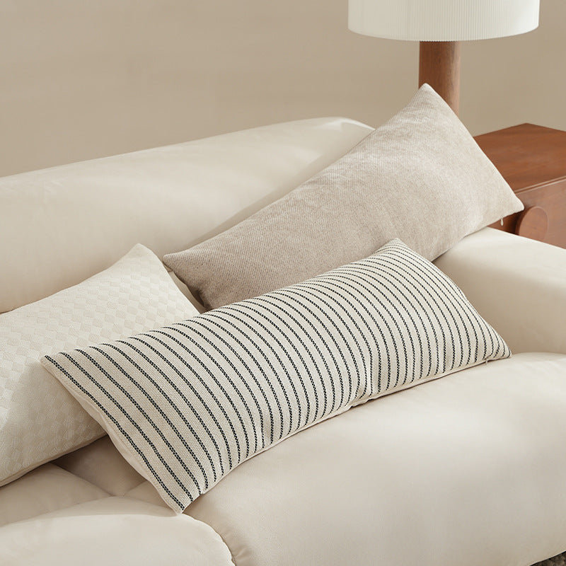 Long rectangular lumbar and neck pillow with textured woven look and concealed zipper Kalsten