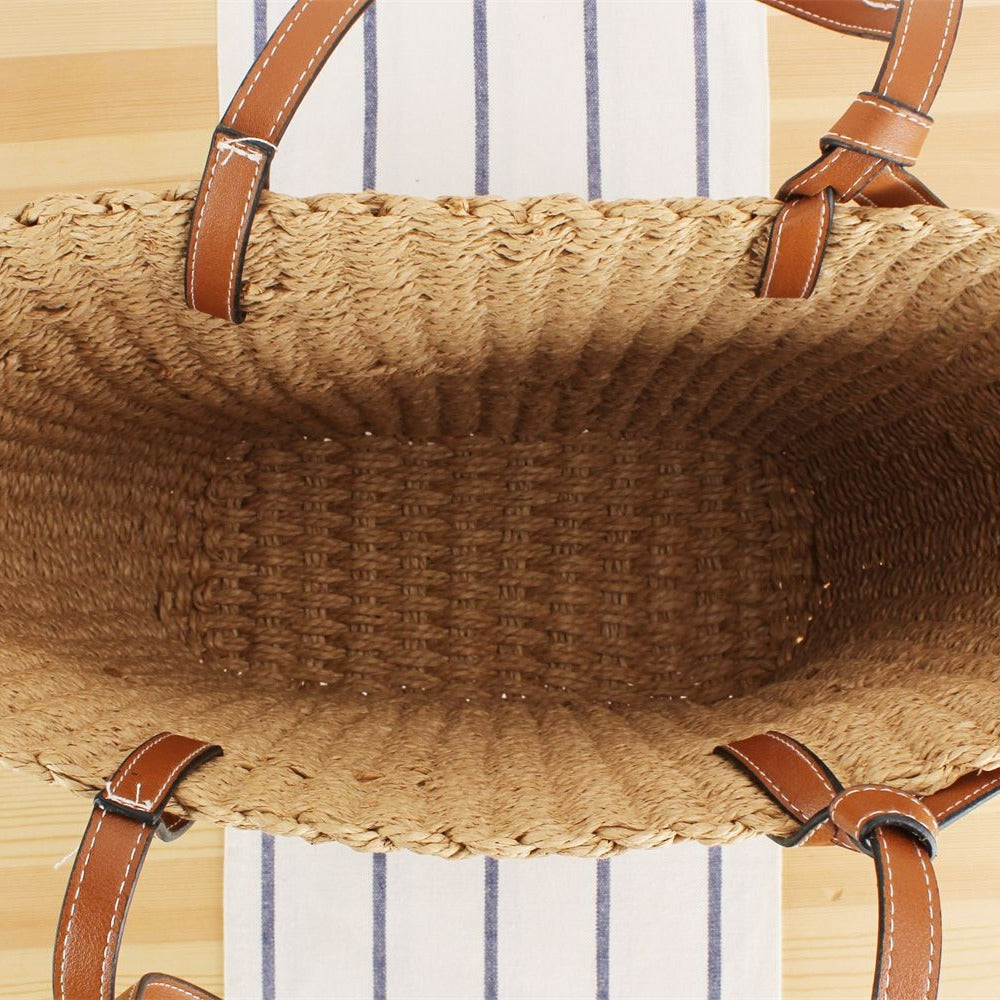 Beach bag made of handwoven natural material with sturdy leather straps Kalsten