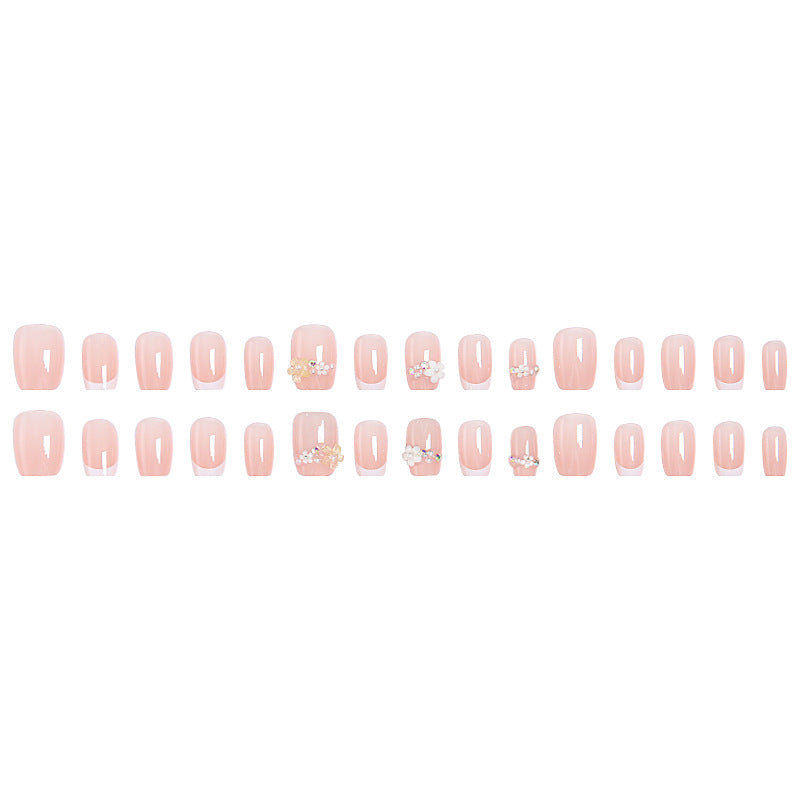 Nail set with elegant flower appliqués and exquisite glitter embellishments Kalsten
