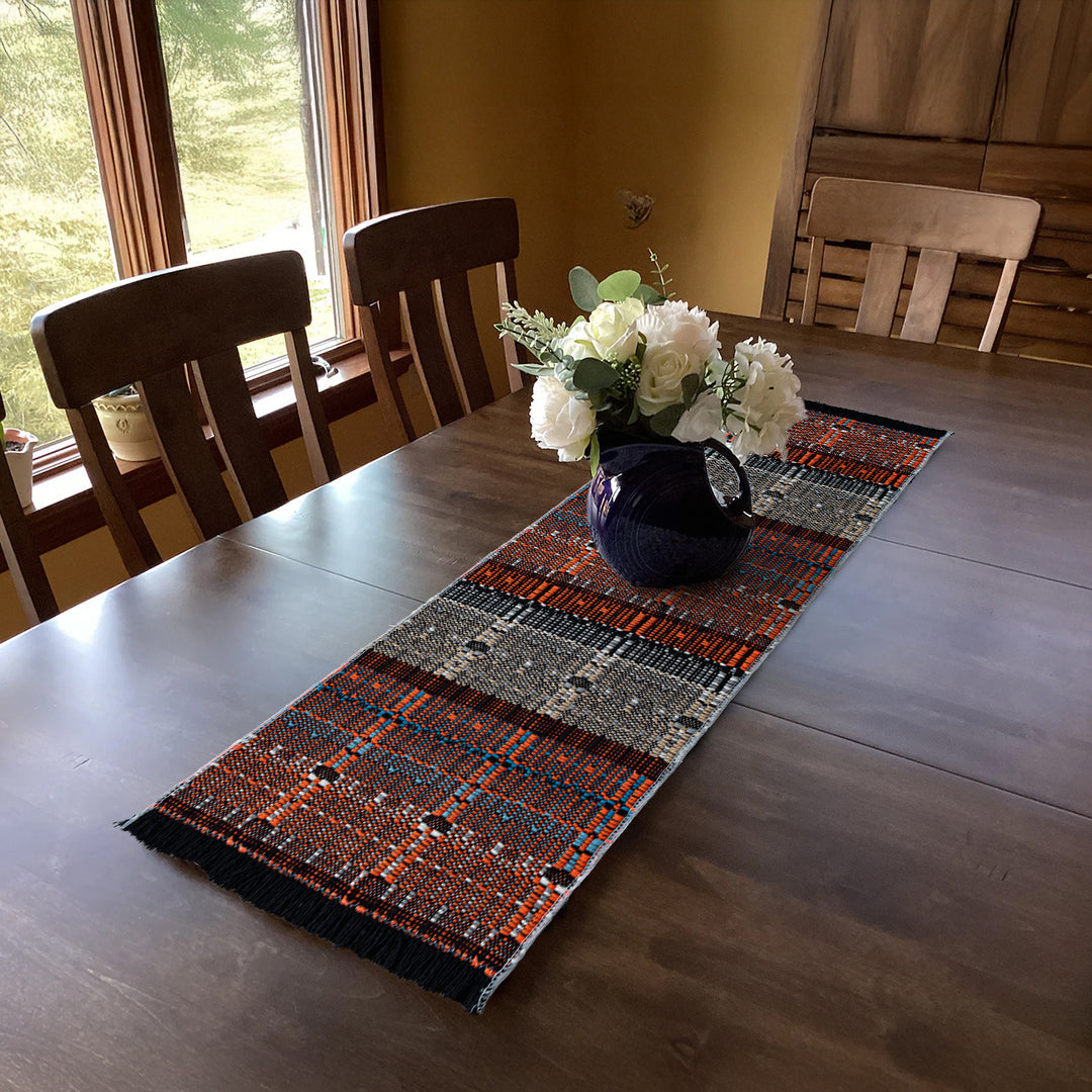Woven table runner in ethnic look made of cotton blend with fringes Kalsten