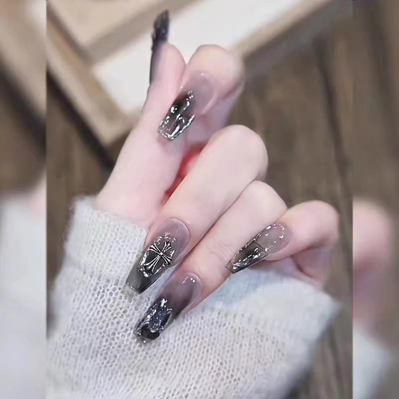 Glamorous artificial nails with heart design and glittering accents Kalsten