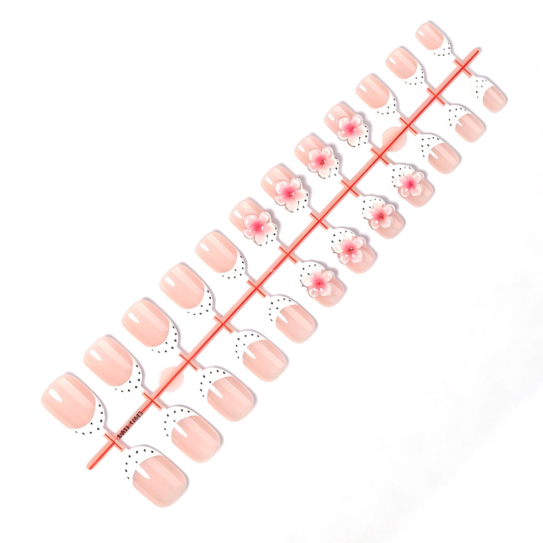 Artificial nail set with delicate floral designs and elegant accents Kalsten