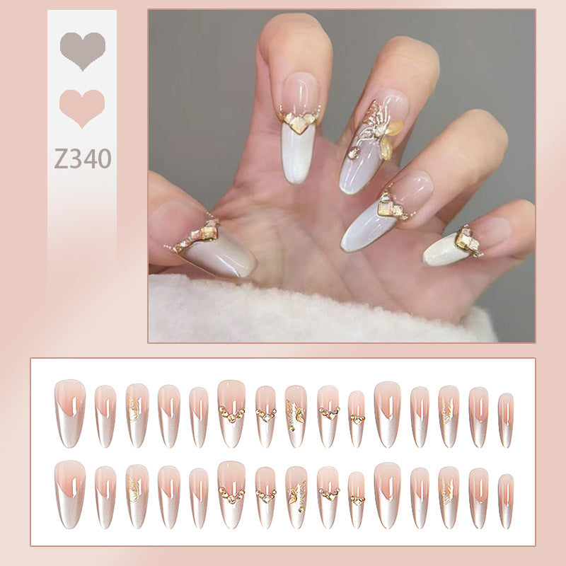 Glamorous art nails with elegant golden details Kalsten
