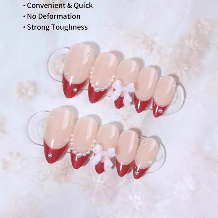 Artificial nail set with glamorous rhinestone and bow decorations Kalsten