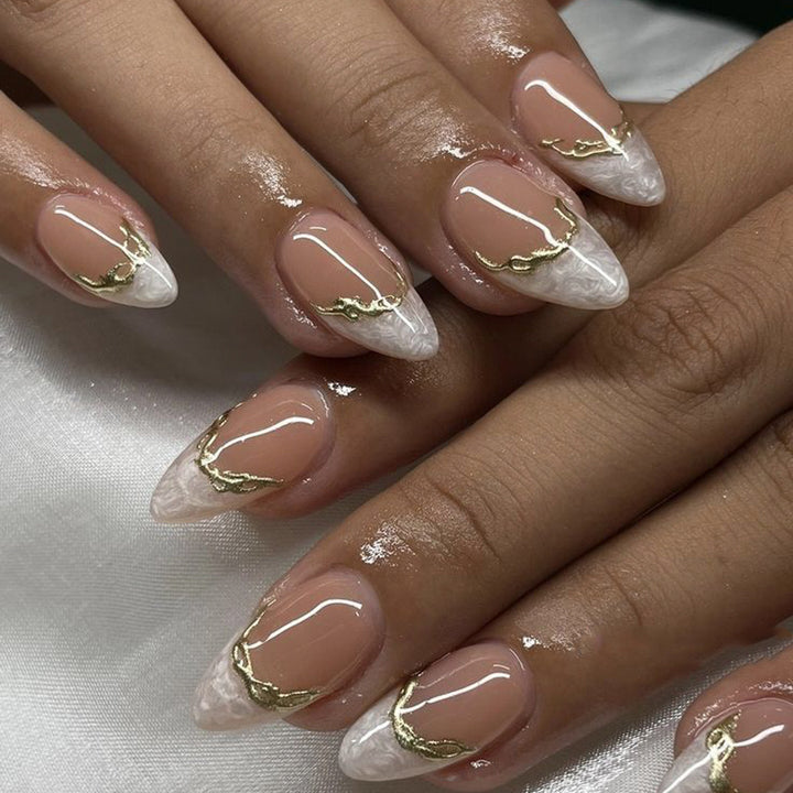 Artful Stiletto Nails with Golden Accents Kalsten
