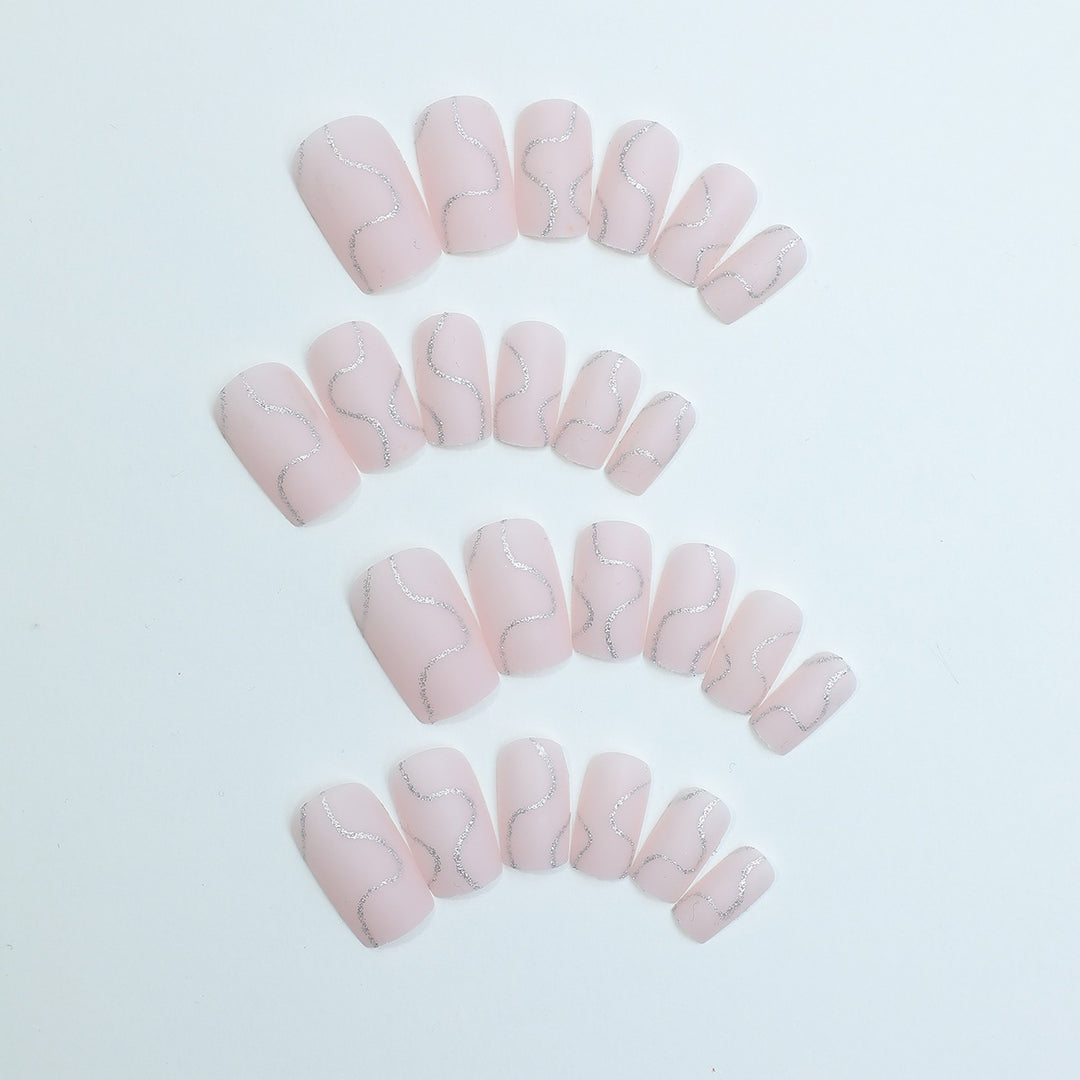 Artificial nail set with elegant lines and glitter accents Kalsten